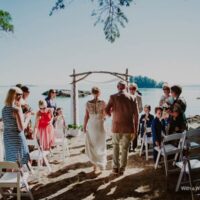 Emily and Neil oceanfront beach wedding at Painted Boat Resort