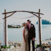 Emily and Neil oceanfront beach wedding at Painted Boat Resort