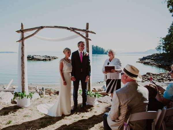 Emily and Neil oceanfront beach wedding at Painted Boat Resort