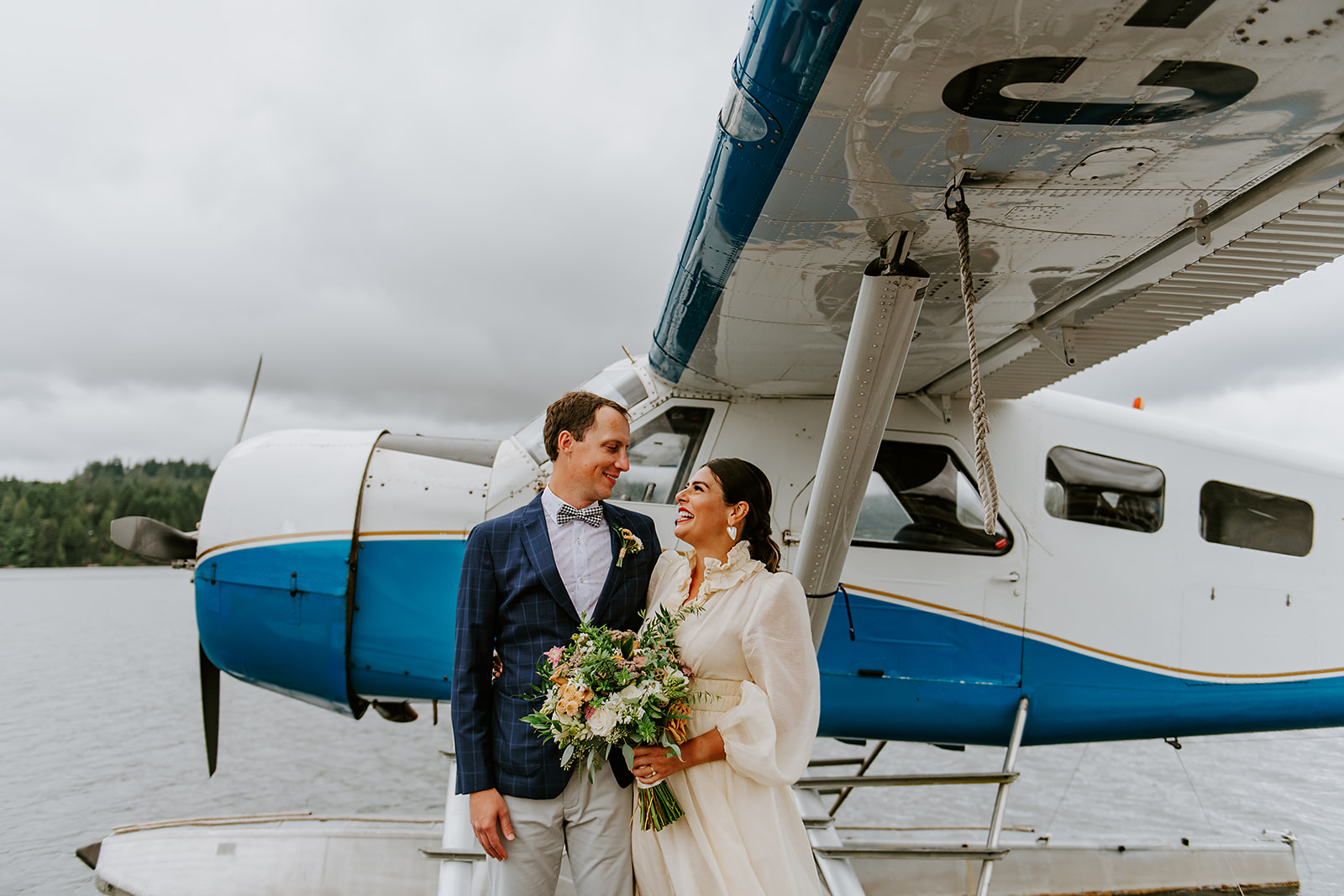 Adventure elopement couple and float plane