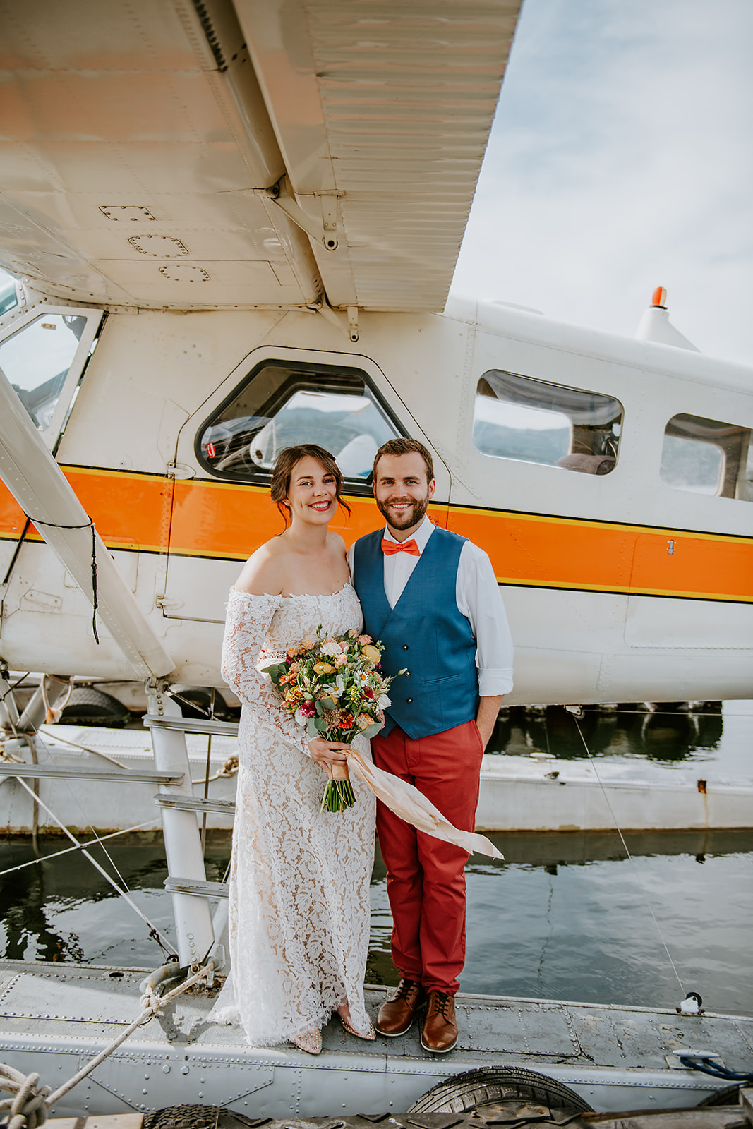 Adventure elopement couple with float place