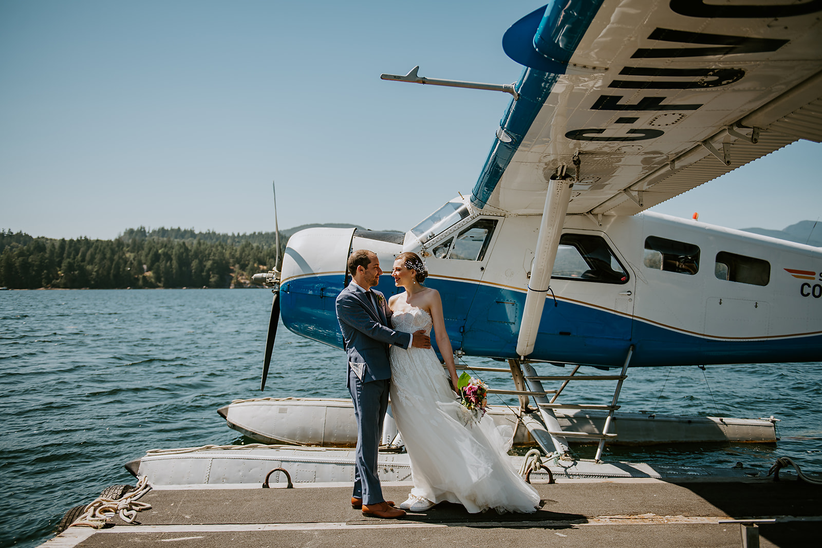 Adventure elopement couple and float plane