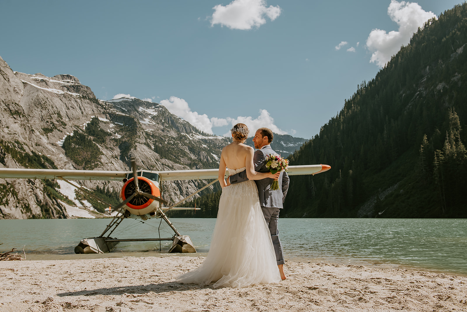Adventure elopement couple and float plane
