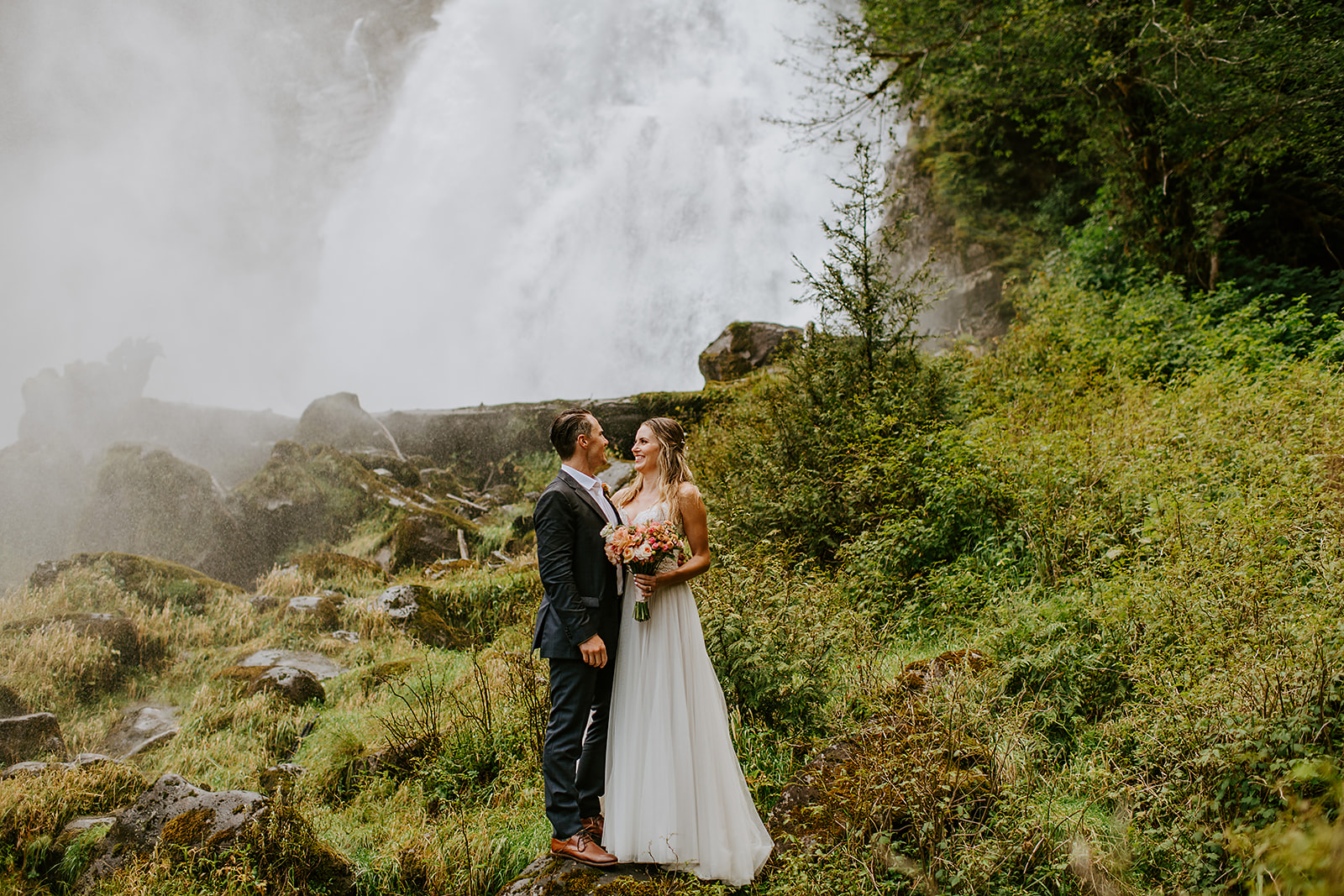 Adventure elopement couple in front of Chatter box falls